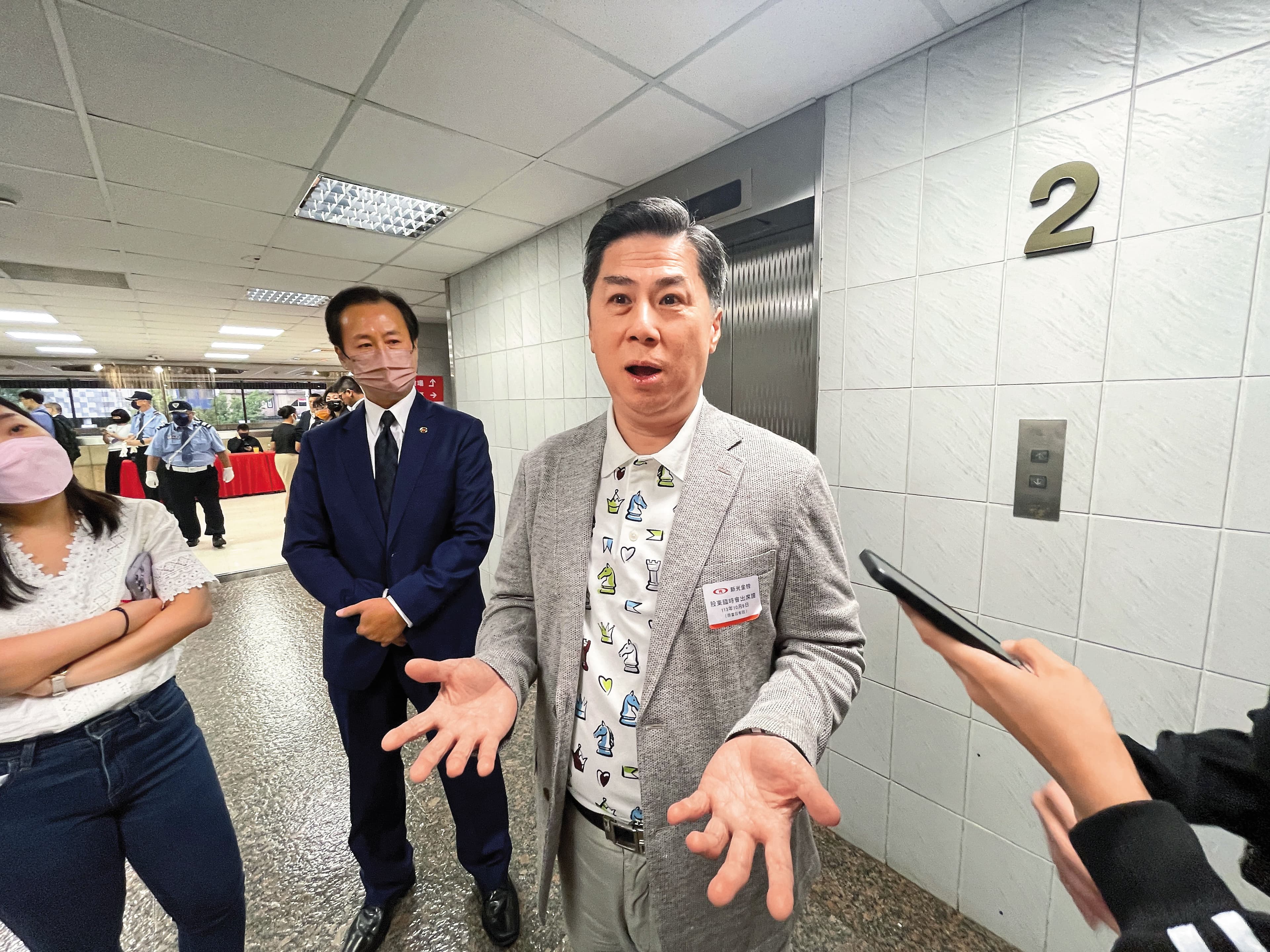 新光金大股東林伯翰（右）是誠新綠能重要投資者。