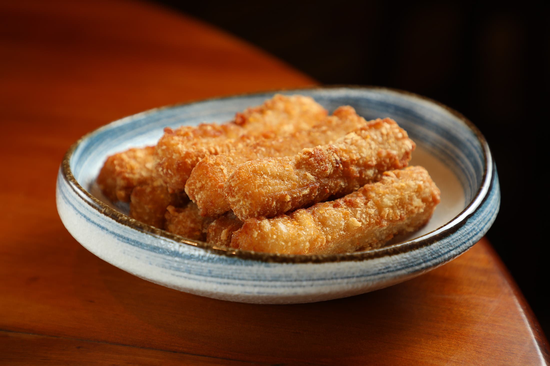「聰明魚薯條」是沙鍋菜常見的邪惡配菜。（林聰明獨享魚薯條鍋658元╱份）