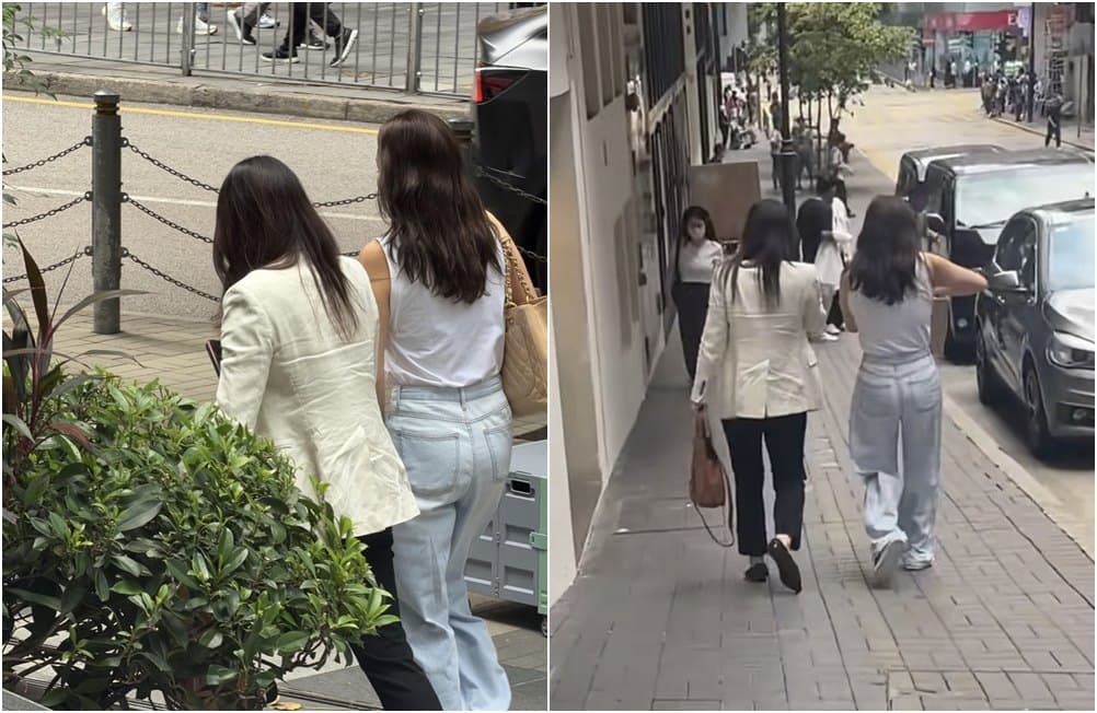 郭晶晶與友人走在中環街頭,身上的亞麻外套皺褶相當明顯,意外掀起「富貴皺」話題。(翻攝LYU小紅書)