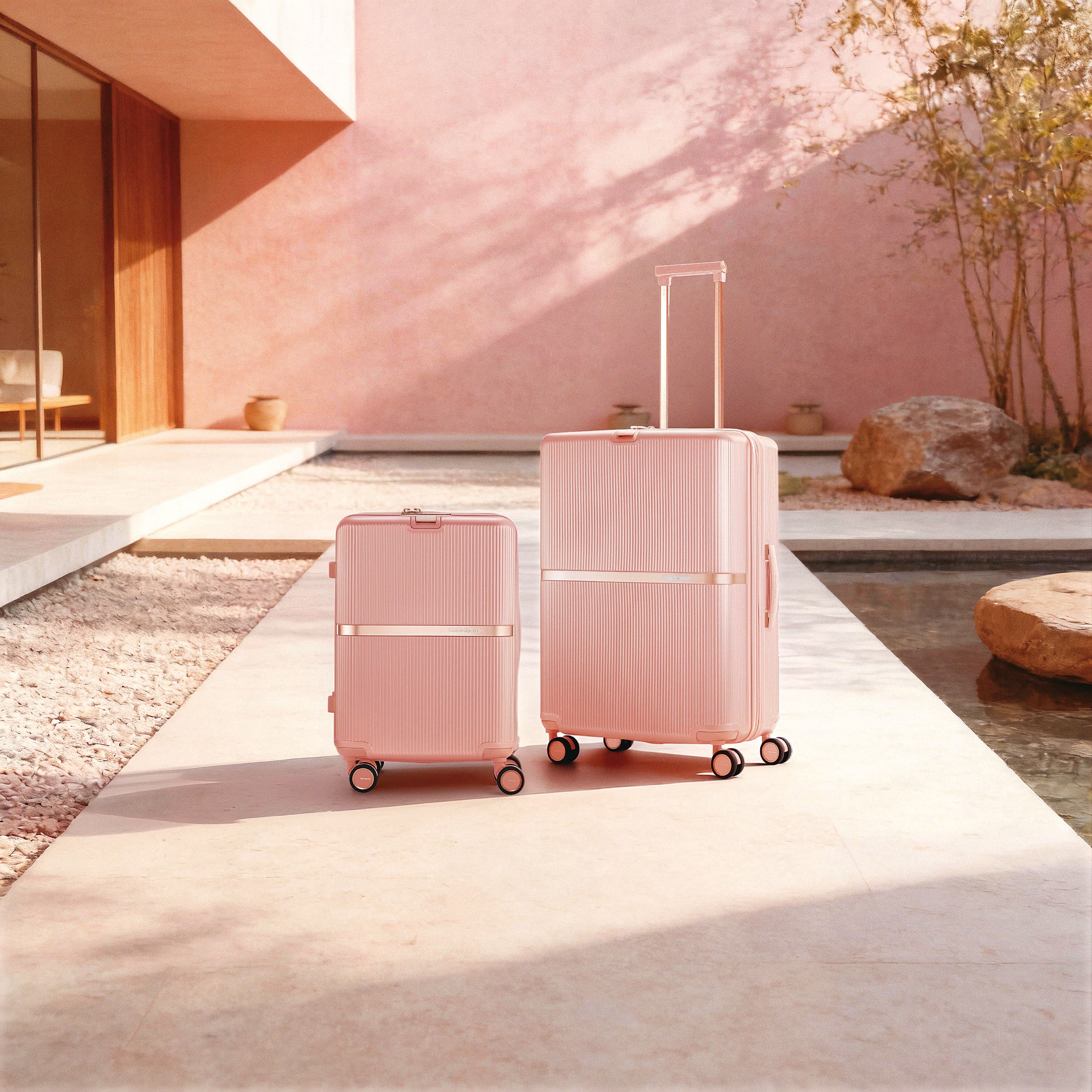 Samsonite MINTER櫻花粉。20吋NT$13,500、25吋NT$15,500、28吋NT$17,500。(Samsonite提供)