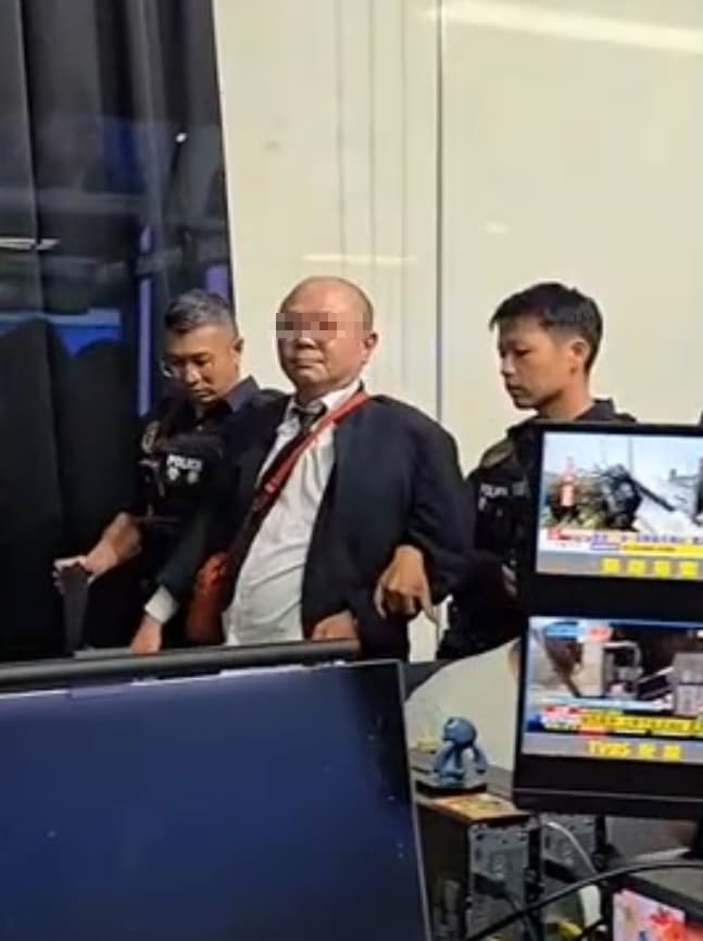 呂姓男子聲稱要討百萬美元的「版權費」，竟闖進電視台。（翻攝畫面）