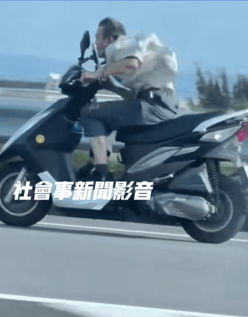 1名男子未戴安全帽騎機車闖國道狂飆，瘋狂模樣嚇壞用路人直呼好怪。（翻攝社會事新聞影音）